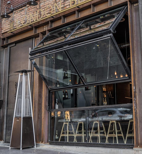 Café storefront with opening bi-fold door